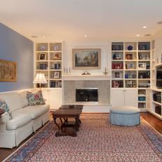 Traditional Colonial Living Room With Built-In Bookshelves