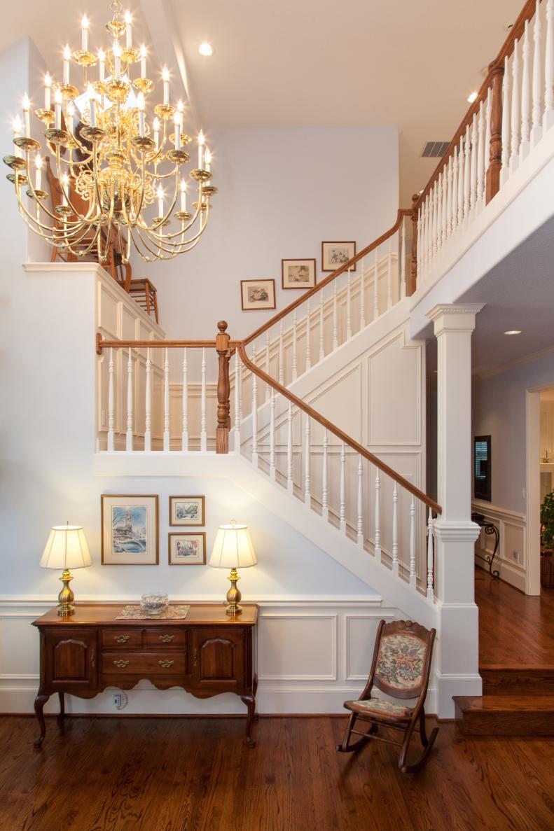 Traditional Entry With Stairwell & Chandelier