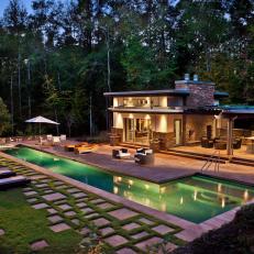 Poolhouse, Patio, Pool and Yard at Night