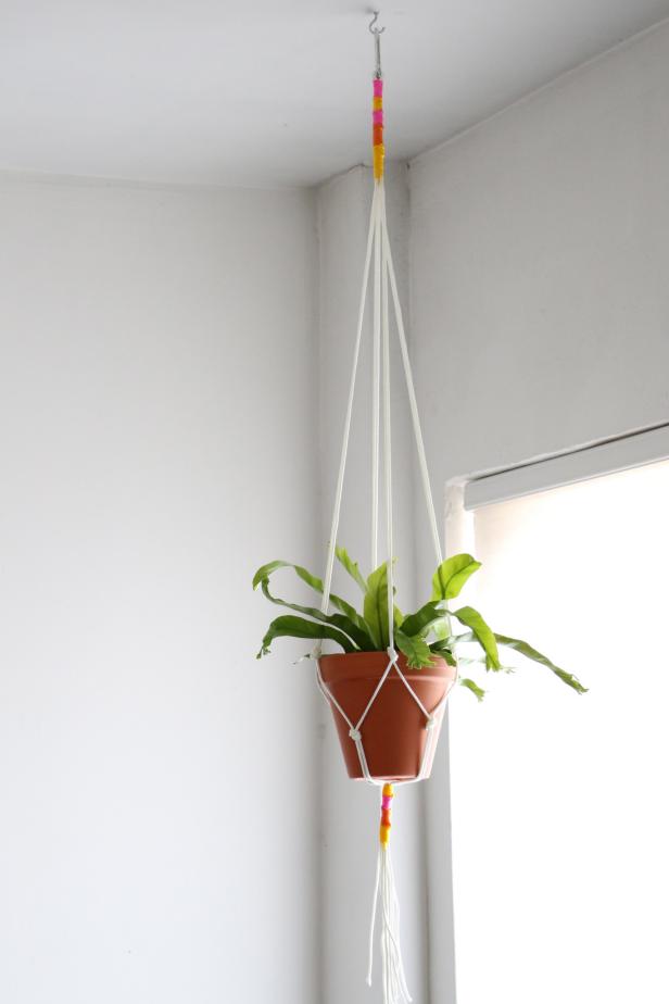 Using all supplies from the hardware store, make this easy hanger to display your favorite plant.