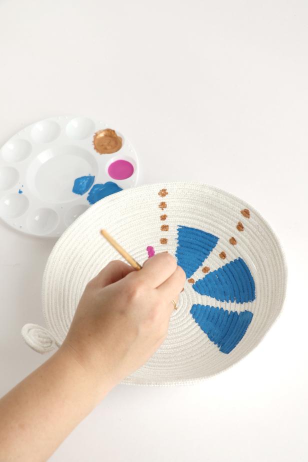 Add some fun color! Use a small paint brush and acrylic paints to create geometric patterns inside the bowls.