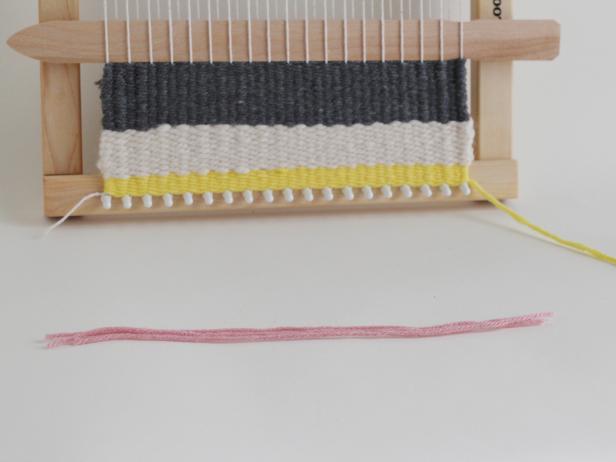 To create fringe, cut three pieces of yarn 6â long.