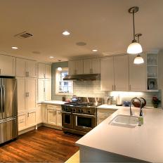 Open Transitional Kitchen Features Beautiful White Cabinetry