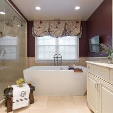 Elegant Burgundy Bathroom With Soaking Tub & Walk-In Shower