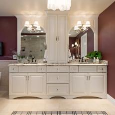 Luxe Burgundy Bathroom Features Elegant White Vanity