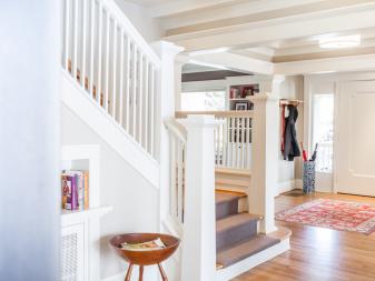 Neutral Transitional Foyer With White Staircase