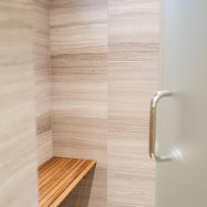Custom Walk-In Shower Features Large Slab Stone Tiling