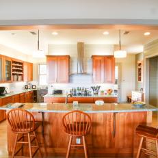 Transitional Eat-In Kitchen Features Warm Wood Cabinets