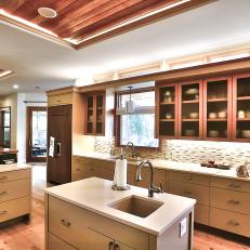 Contemporary Earth-Toned Kitchen Features Small Prep Island