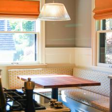 Cheerful Banquette With Mahogany Tabletop in Transitional Kitchen