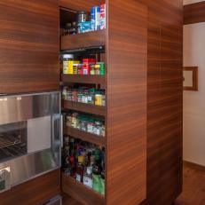 Brown Wood Kitchen Cabinet With Pull-Out Spice Rack