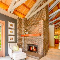 Brick Fireplace With Cedar Mantel