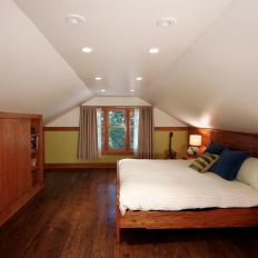 Warm Wood Fills Traditional Master Bedroom