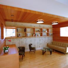 Cozy Home Office & Library With Contemporary Wood Paneling