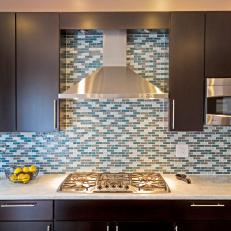 Mosaic Tile Backsplash Pops in Contemporary Kitchen