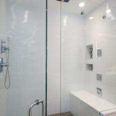 Modern White Shower With Frameless Glass Enclosure