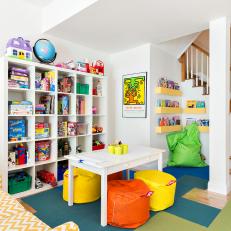 Basement Playroom Features Toy Storage & Play Table