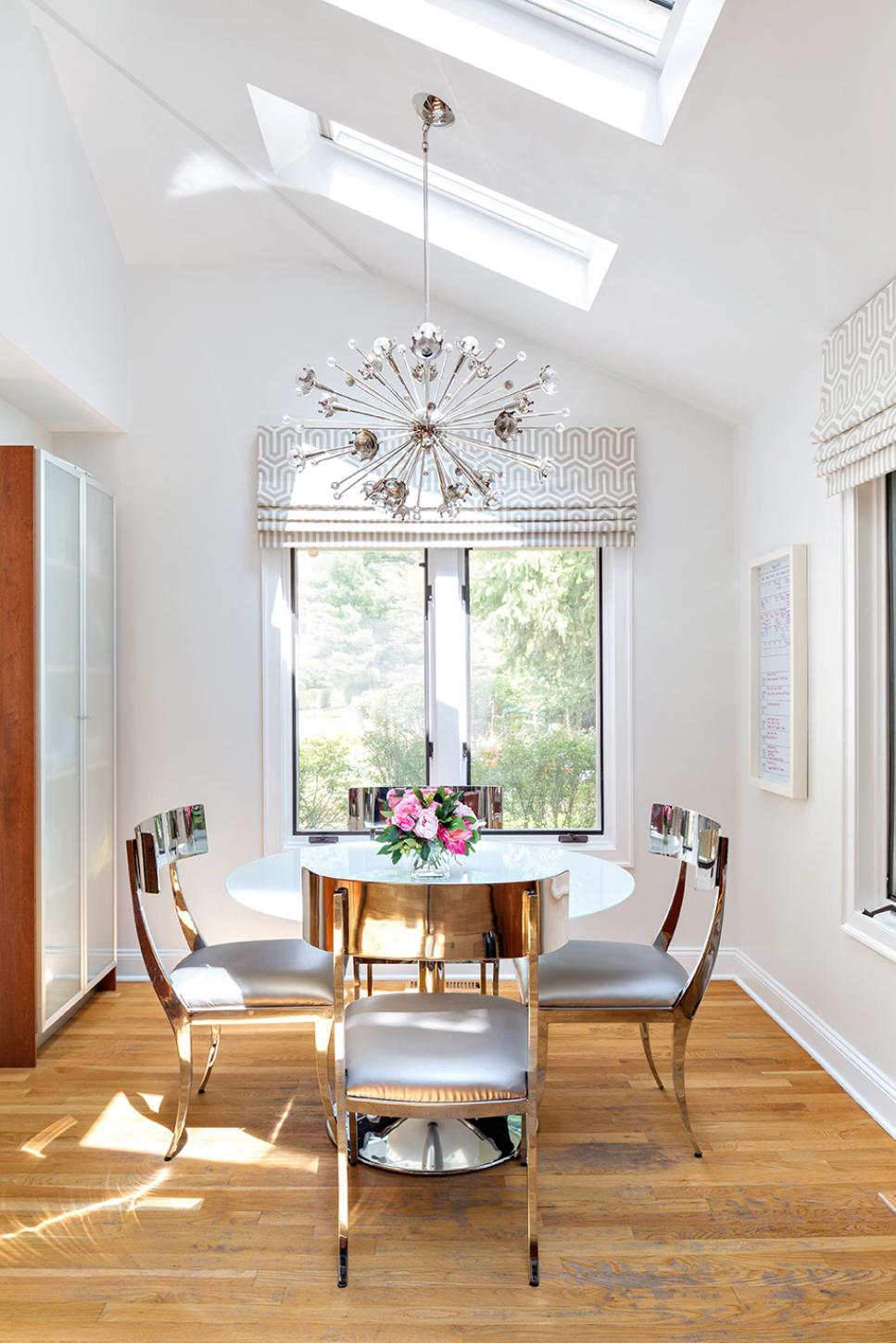 Ultra-Modern Kitchen Dining Area in White and Silver | HGTV