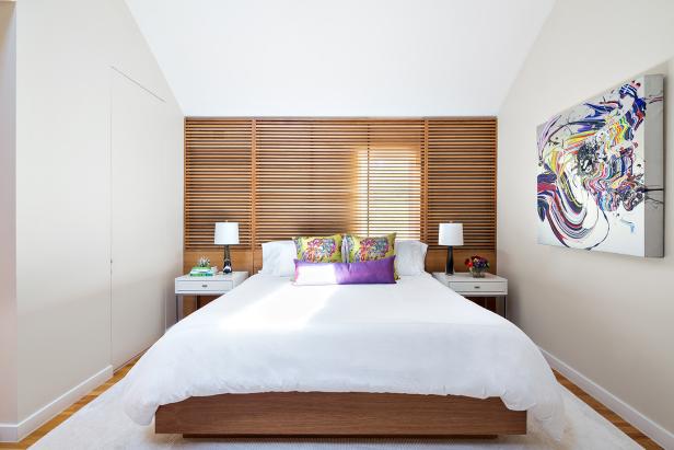 Modern Neutral Bedroom With Slatted Wall, Colorful Pillows & Art