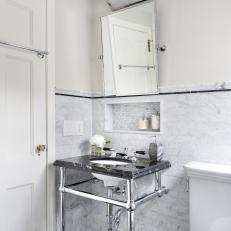 Black and White Guest Bathroom With Console Sink