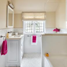 Soft-Hued Hall Bathroom in Cream and White