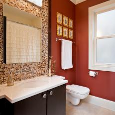 Rust Orange Bathroom Features Dotted Mosaic Tile Backsplash