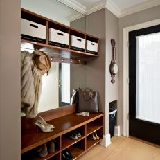 Elegant Mudroom Features Wooden Storage Shelves