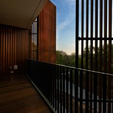 Contemporary Wood Deck With Steel Railing