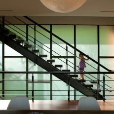 Sleek Staircase With Ebonized Oak Treads