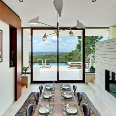 Midcentury Modern Dining Room With Pool View