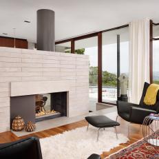 Cozy Midcentury Modern Living Room With Two-Sided Fireplace
