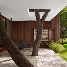 Modern Porch Built Around Beautiful Oak Trees