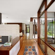 Modern Foyer Boasts Natural Light & Warm Wood Accents