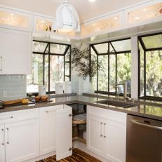 Transitional Kitchen Features White Shaker Cabinets & Angled Windows