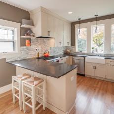 Chic Transitional Eat-In Kitchen With Peninsula