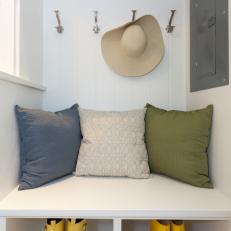Hat and Book Storage in Laundry Room