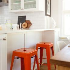 Bright Red Stools Give Warmth to Space