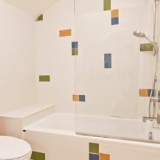 Modern Kid's Bathroom With Colorful Tile Shower Accents