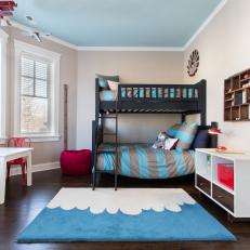 Stylish Boys' Bedroom With Blue and Red Accents