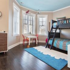 Contemporary Boy's Bedroom Features Dark Wood Bunk Beds