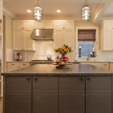 Stylish Transitional Kitchen With Woodgrain Island and White Cabinetry 