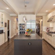Transitional Kitchen With White Cabinets & Brown Island