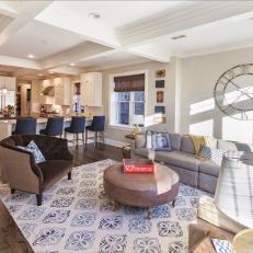 Open Contemporary Living Room With Coffered Ceiling and Blue Accents 
