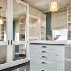 Teal and White Transitional Master Closet