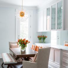 Soft Blue Dining Room With Sputnik Glass Chandelier