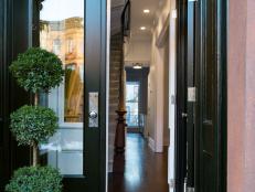 Black Front Doors With Potted Topiary
