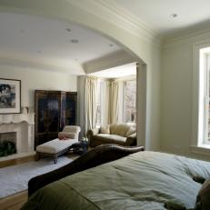 Elegant Master Bedroom With Comfortable Seating