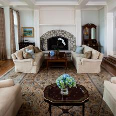Comfy Traditional Living Room With Coffered Ceiling & Soft Blue Accents