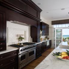Double Oven & Dark Stained Cabinetry in Lakefront Kitchen