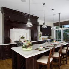 Lakefront Kitchen Features Rich Wood Cabinetry & Island
